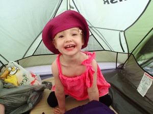 Happiness is playing inside your big cousin's tent